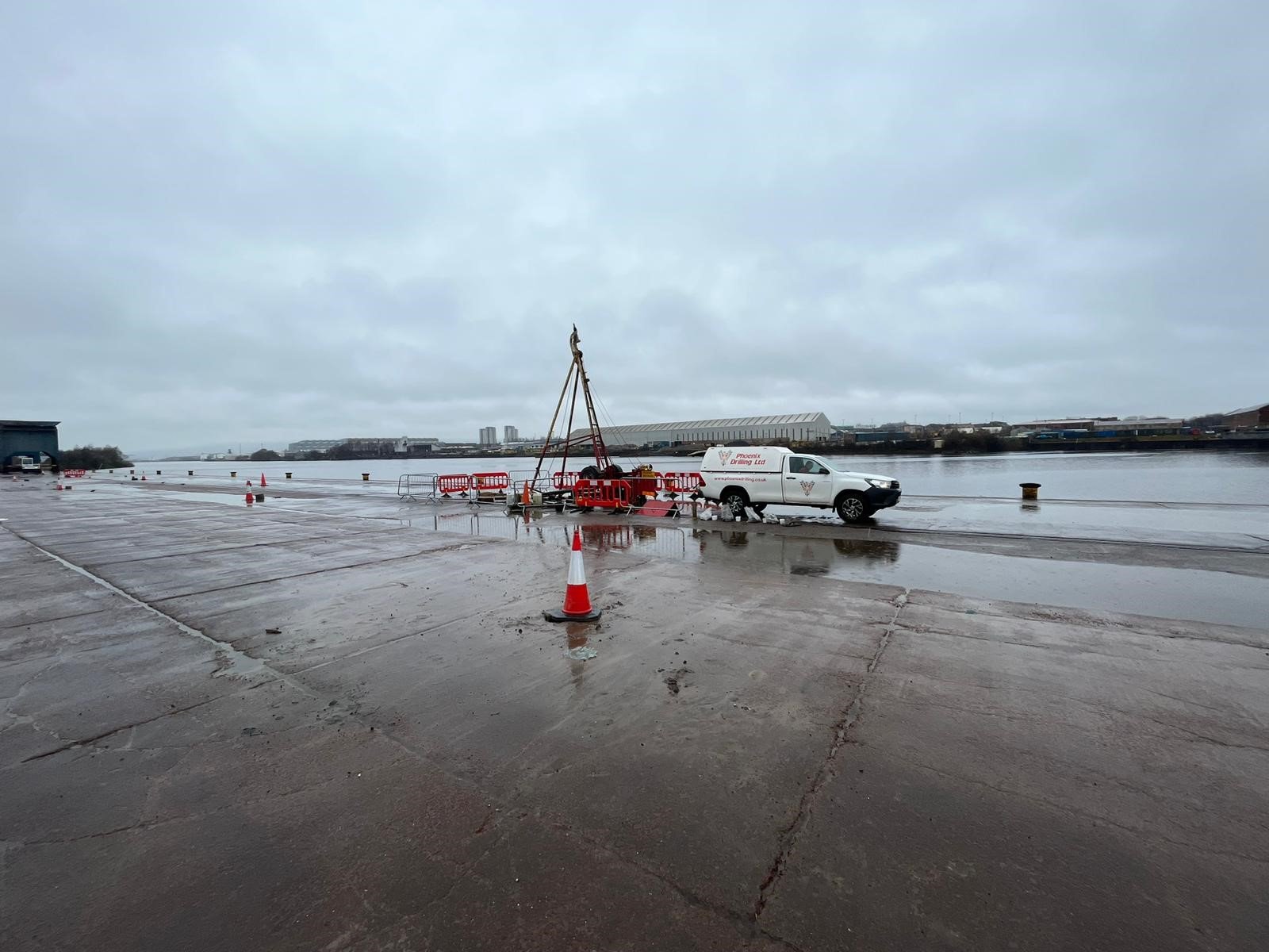 a image of a van unloading equipment on the docks